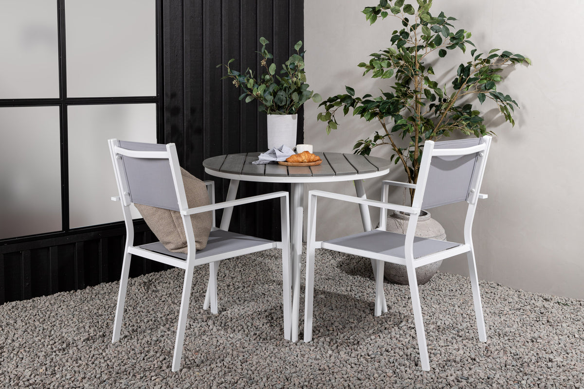 Break Matbord med Copacabana Stolarna – Bord: ⌀90 Stol: 60,5x88x56,5